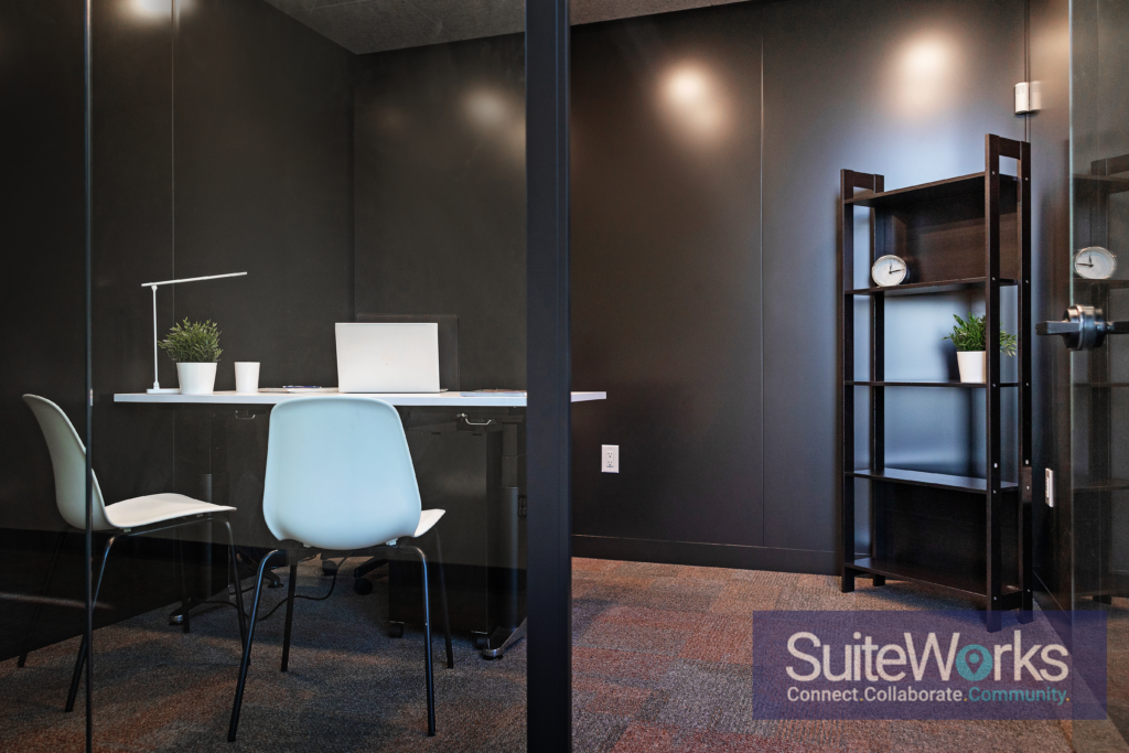 Professional remote worker using coworking space in Barrie instead of a coffee shop at SuiteWorks flexible office space